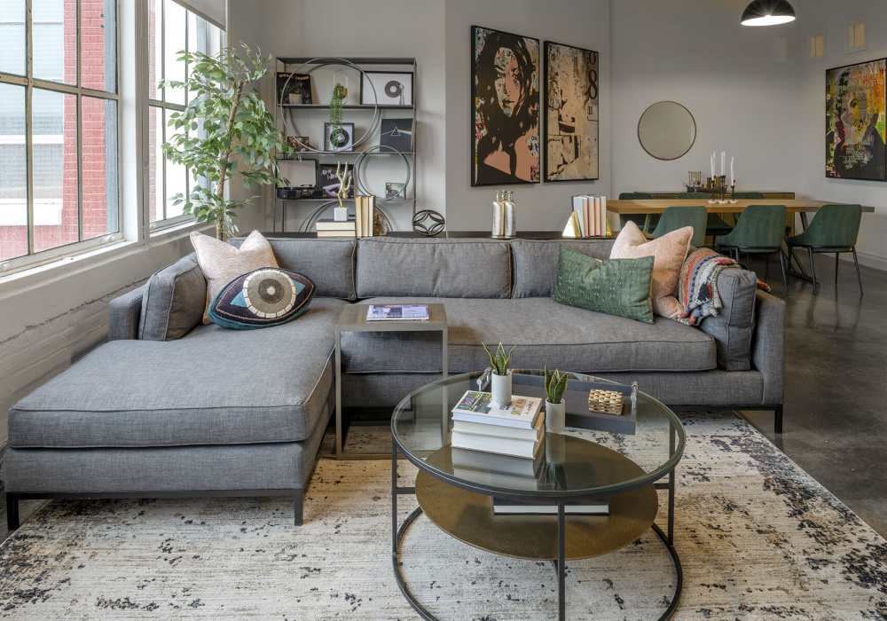 Modern open layout with stylish furnishings at American Can Apartments in New Orleans, Louisiana