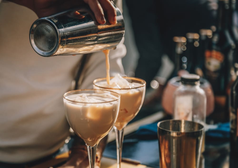 Pouring drinks at a bar near Sherwood in Folsom, California