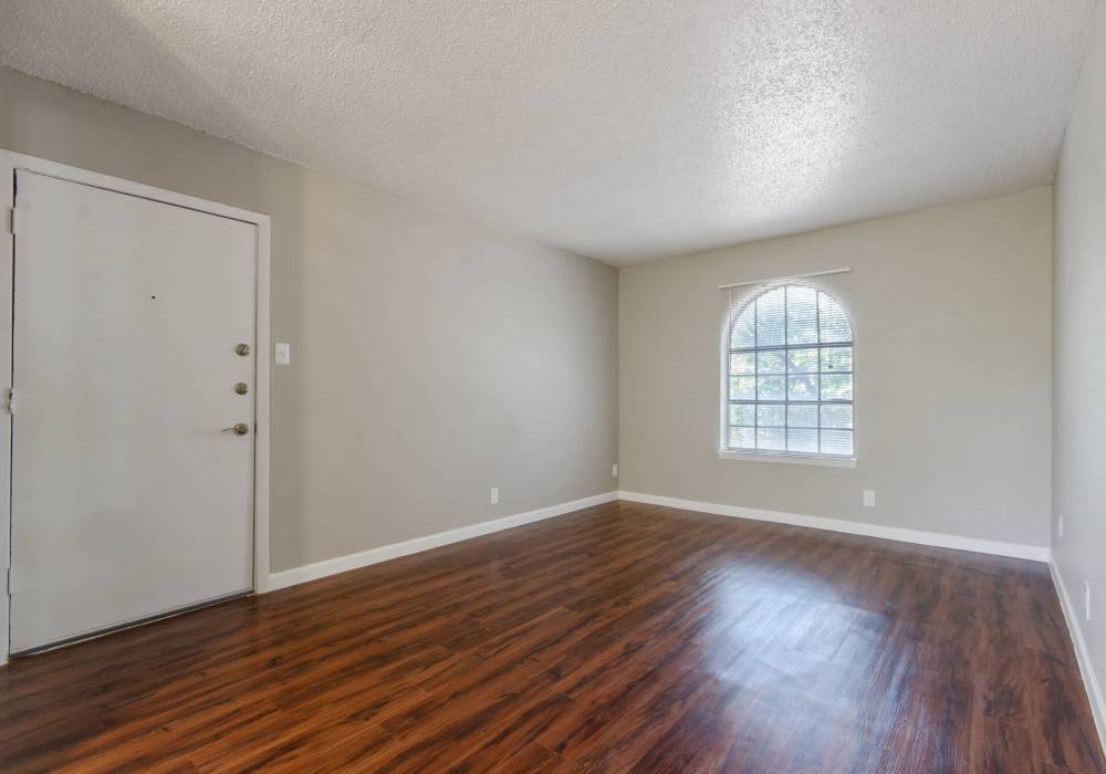 Bedroom with windows at 1000 Mary Apartment Homes in Iowa Park,Texas