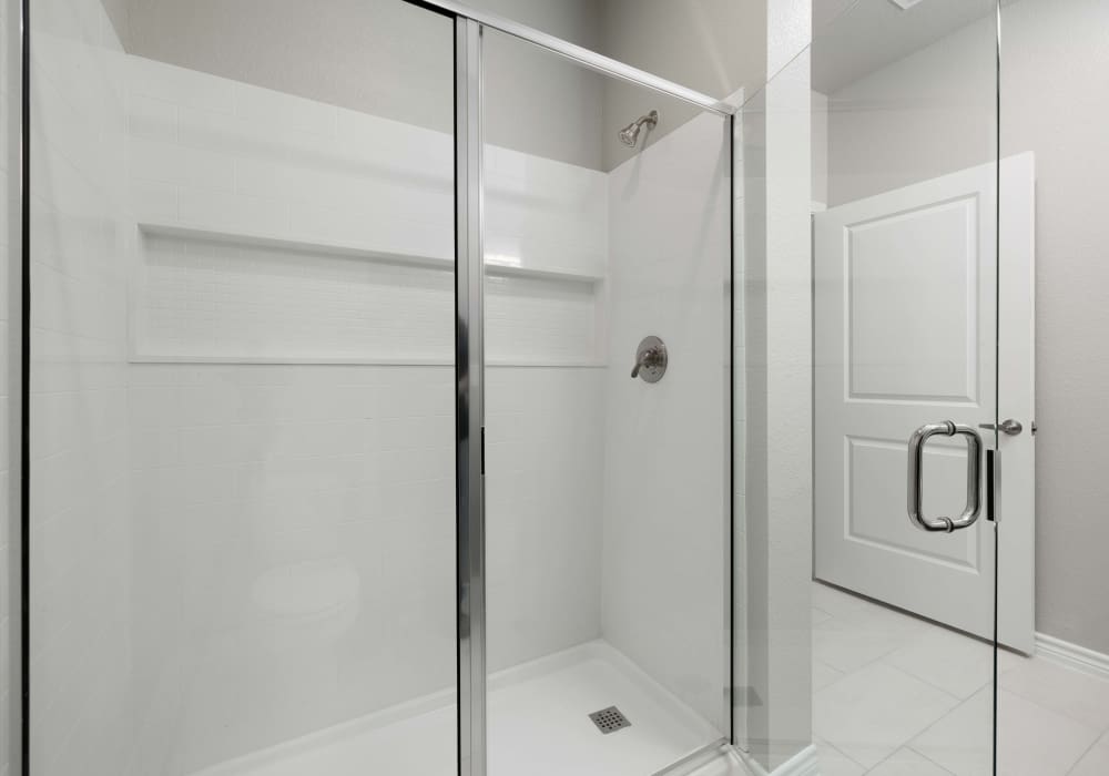 Modern glass shower enclosure at Balcones Trails in Kyle, Texas