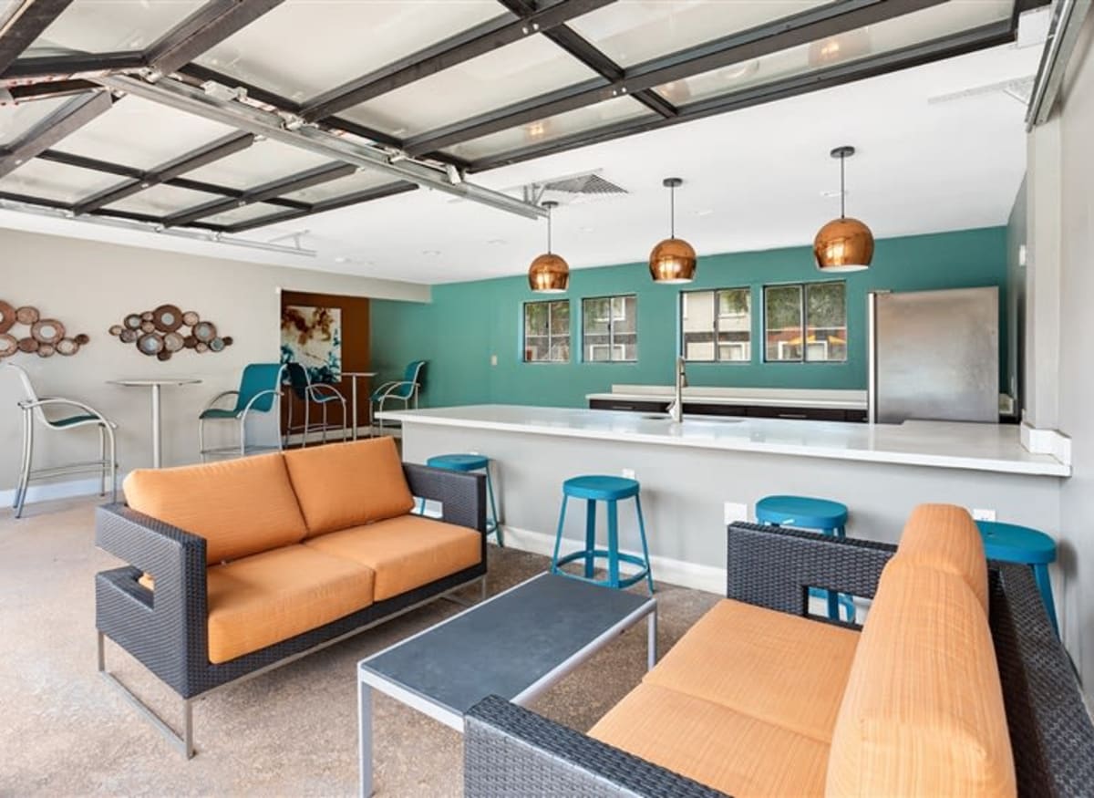 A poolside community kitchen at Argenta Apartments in Mesa, Arizona