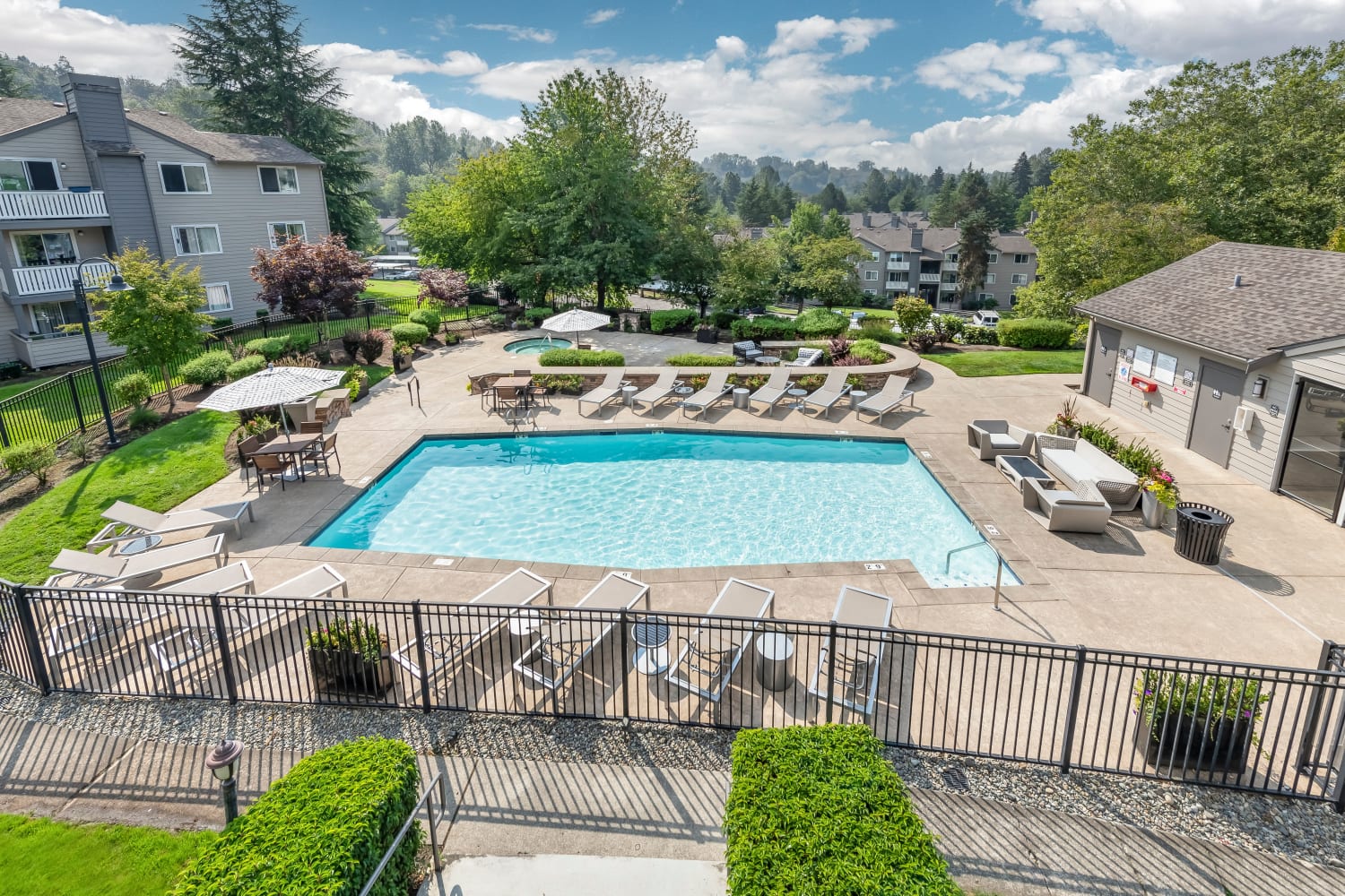 Hot tub by the pool at The Preserve at Forbes Creek in Kirkland, Washington