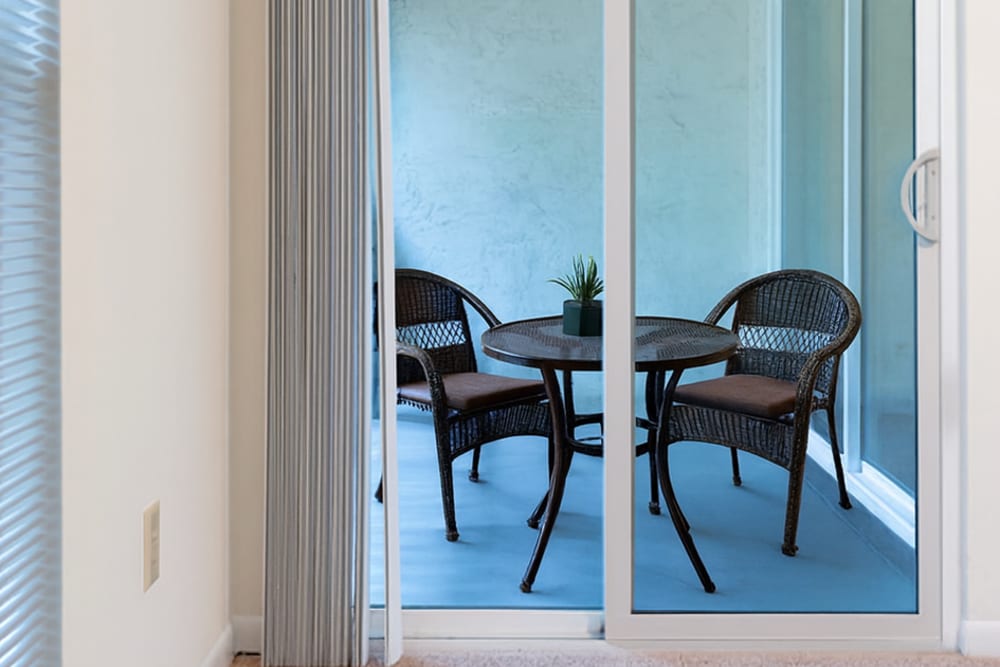 Relaxing at private balcony at Creekwood Apartments in Gainesville, Florida