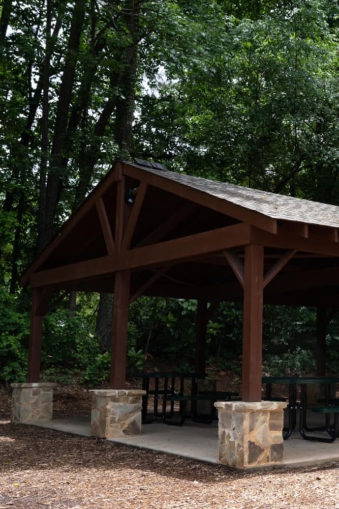 Covered picnic tables at Foxwood Apartments in Doraville, Georgia