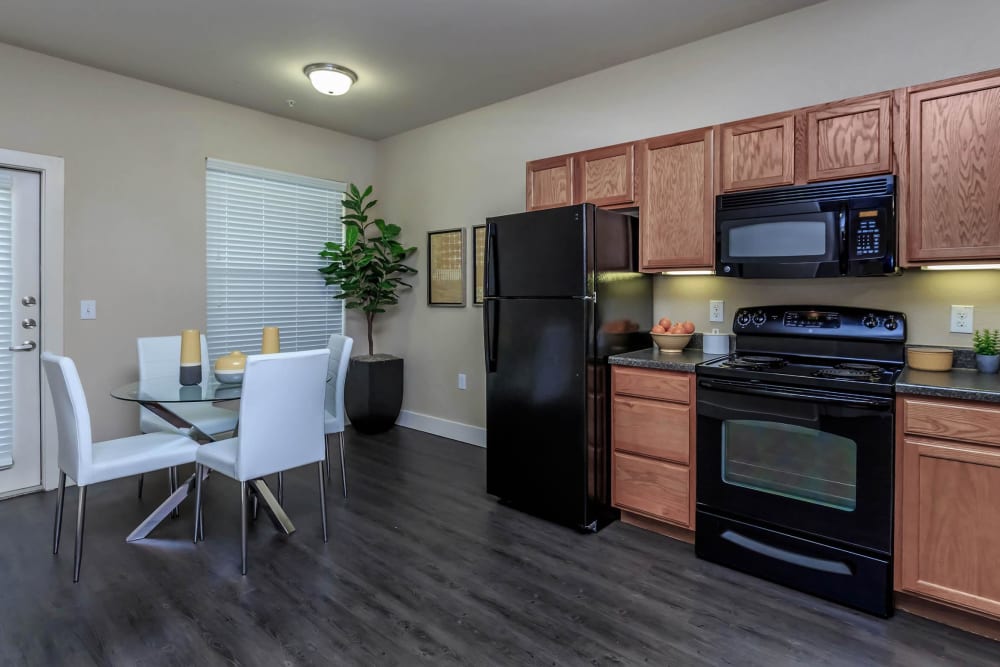 Apartment dining room and kitchen at Lotus Village in Austin, Texas