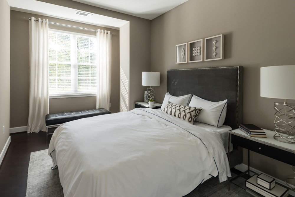 Wood style floors in the bedroom with giant floor to ceiling windows at 700 Constitution in Washington, District of Columbia