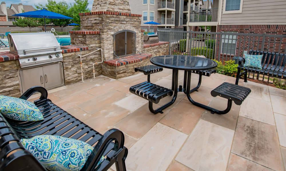 Outdoor firepit and seating at Crown Pointe Apartments in Oklahoma City, Oklahoma