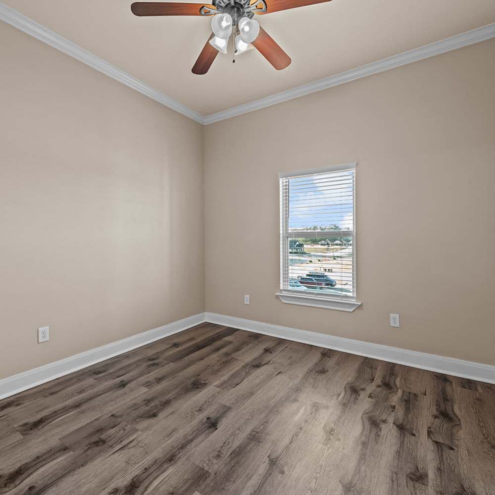 Bedroom with window at The Arbors of Mineola in Mineola. TX