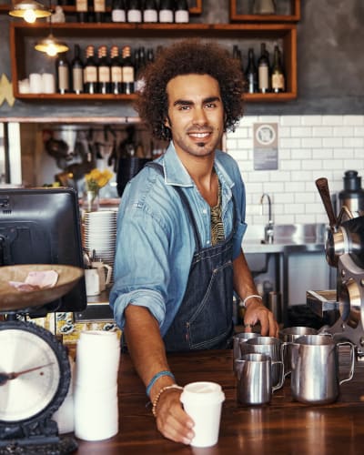 Hipster millennial serving you some coffee