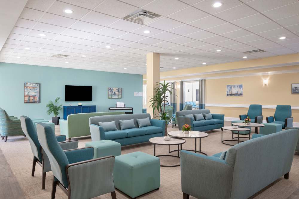 Community seating area at The Pineapple House at Sapphire Lakes in Naples, Florida