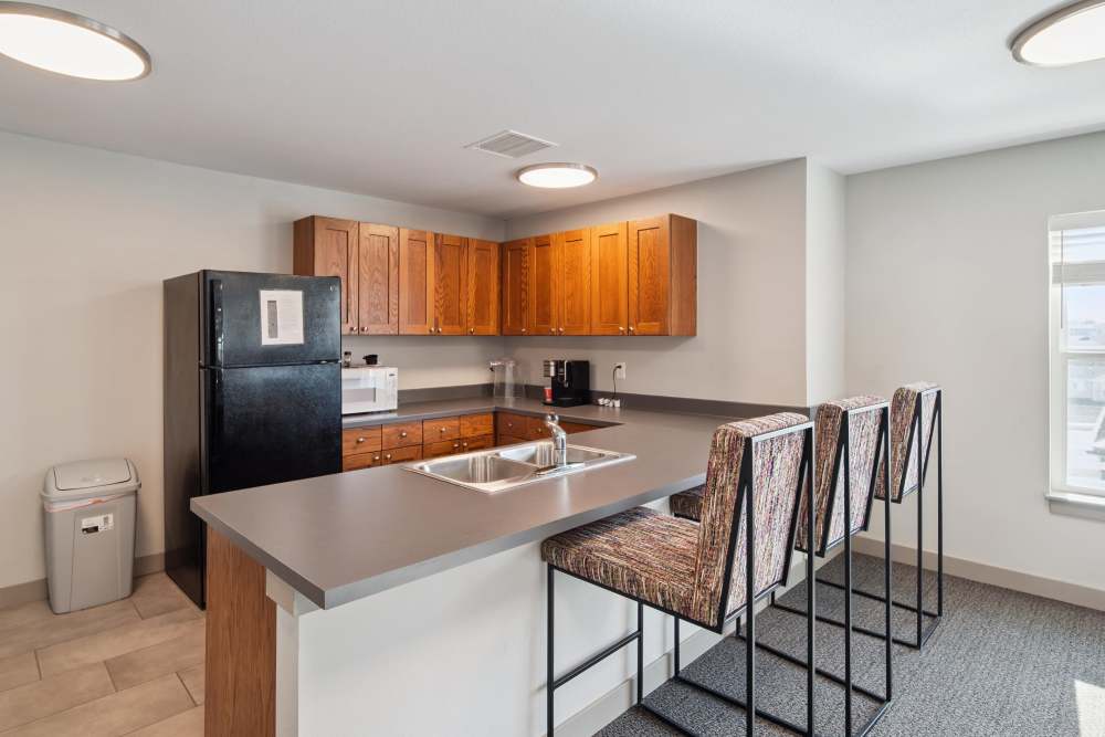 Kitchen with seating space at Villas At Mesa Ridge in Fountain,Colorado