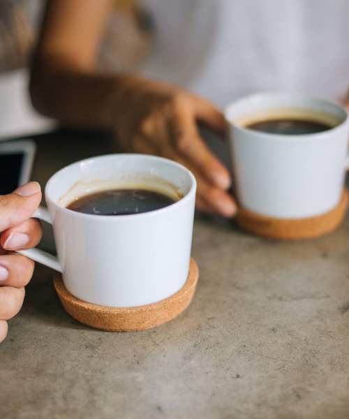 Two cups of coffee on a table near The Marling in Madison, Wisconsin
