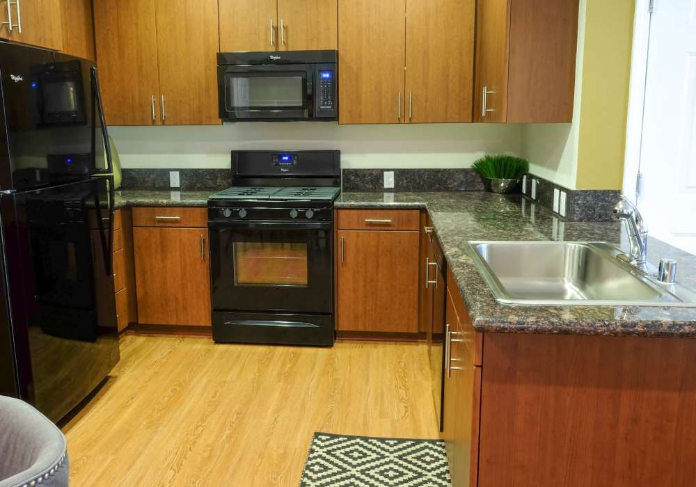 Luxury kitchen with granite countertops at Pacific Landing in Murrieta, California