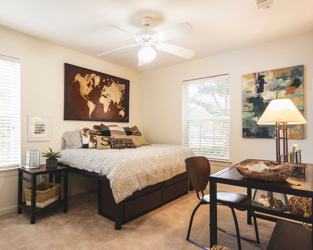 Spacious master bedroom with plush carpeting at Sunchase at James Madison in Harrisonburg, Virginia