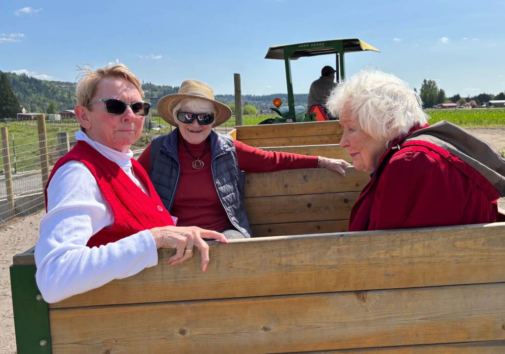 Residents enjoying a ride at Merrill Gardens at Wright Park in Tacoma, Washington