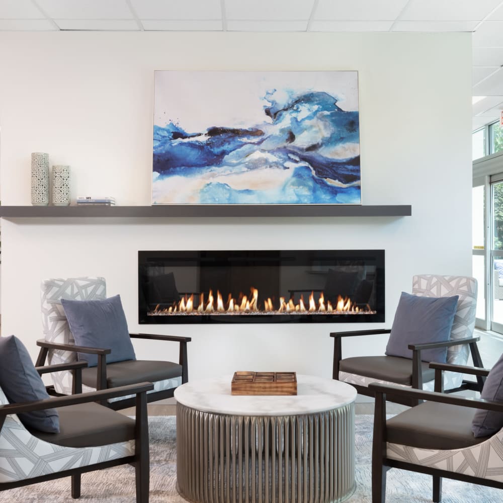 Sitting area by the gas fireplace at Golden West Tower Apts in Torrance, California