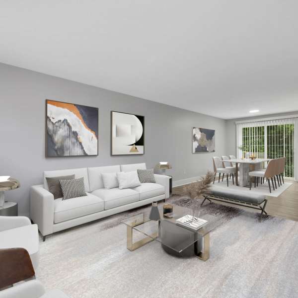 Spacious living room with modern decor at Valley Brook Townhomes in Rochester, New York