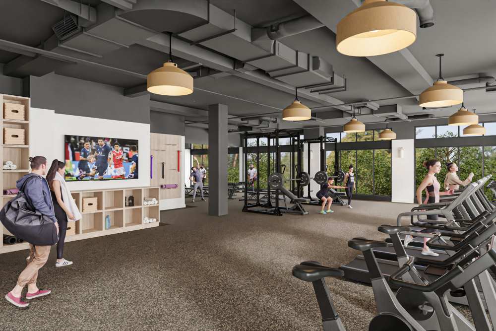 Residents in fitness center at St. Albans Lofts in Raleigh, North Carolina