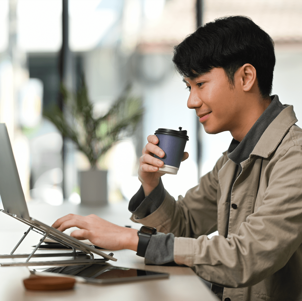 Working from a coffee shop near Verso Luxury Apartments in Davenport, Florida