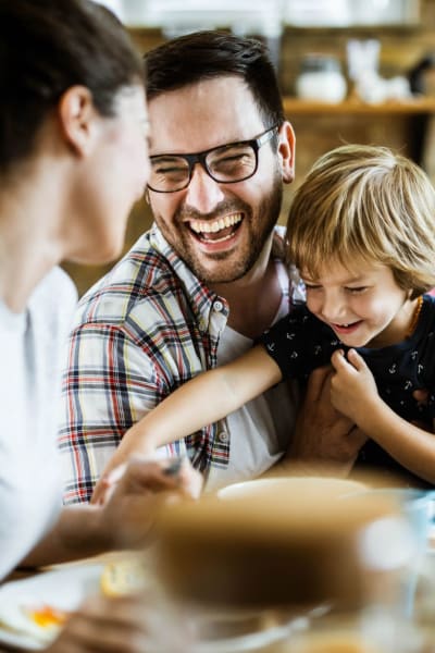 A family enjoys a meal out near Reserve at Chino Hills, Chino Hills, California