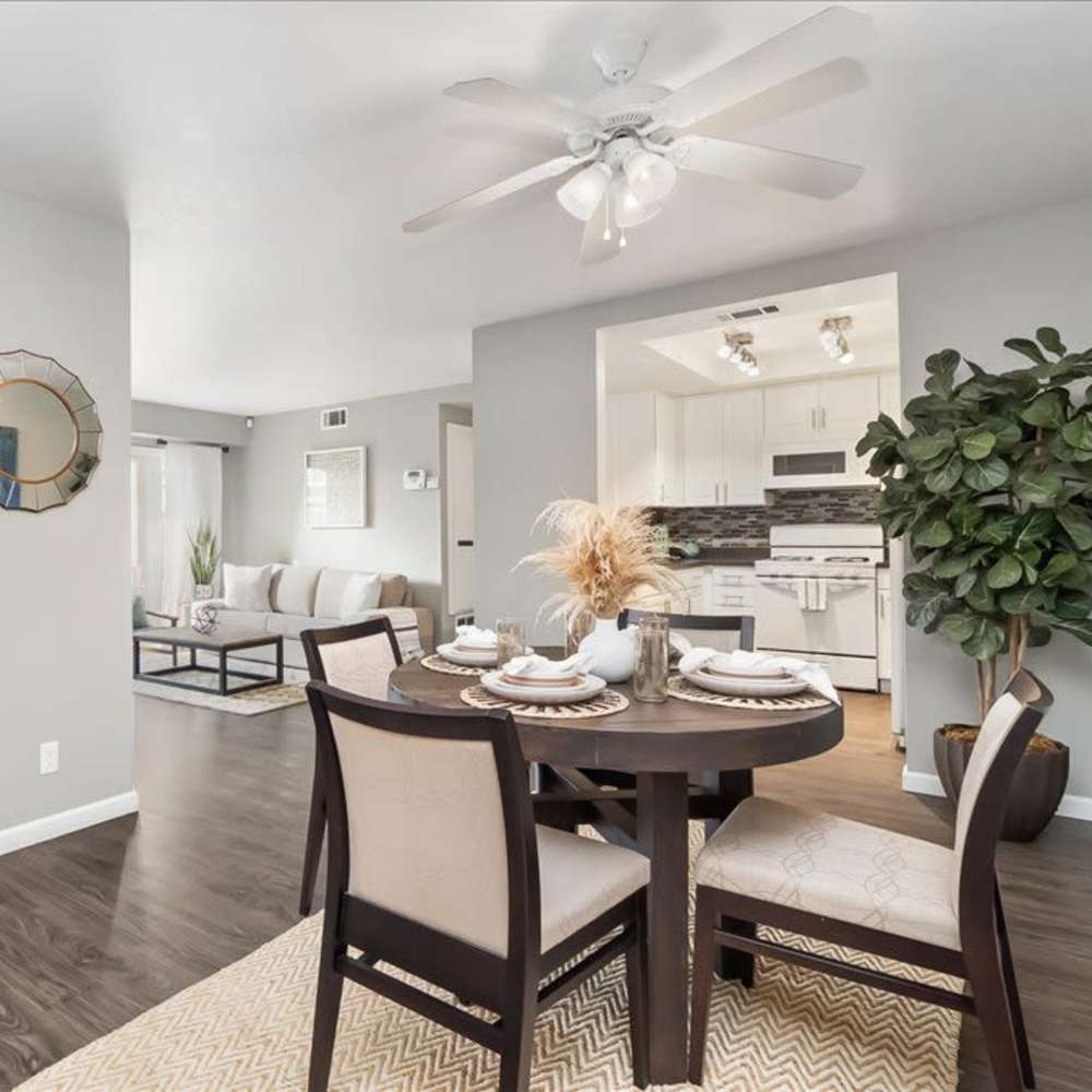 Dining area with ceiling fan at Mirabella Apartments in Bermuda Dunes, California