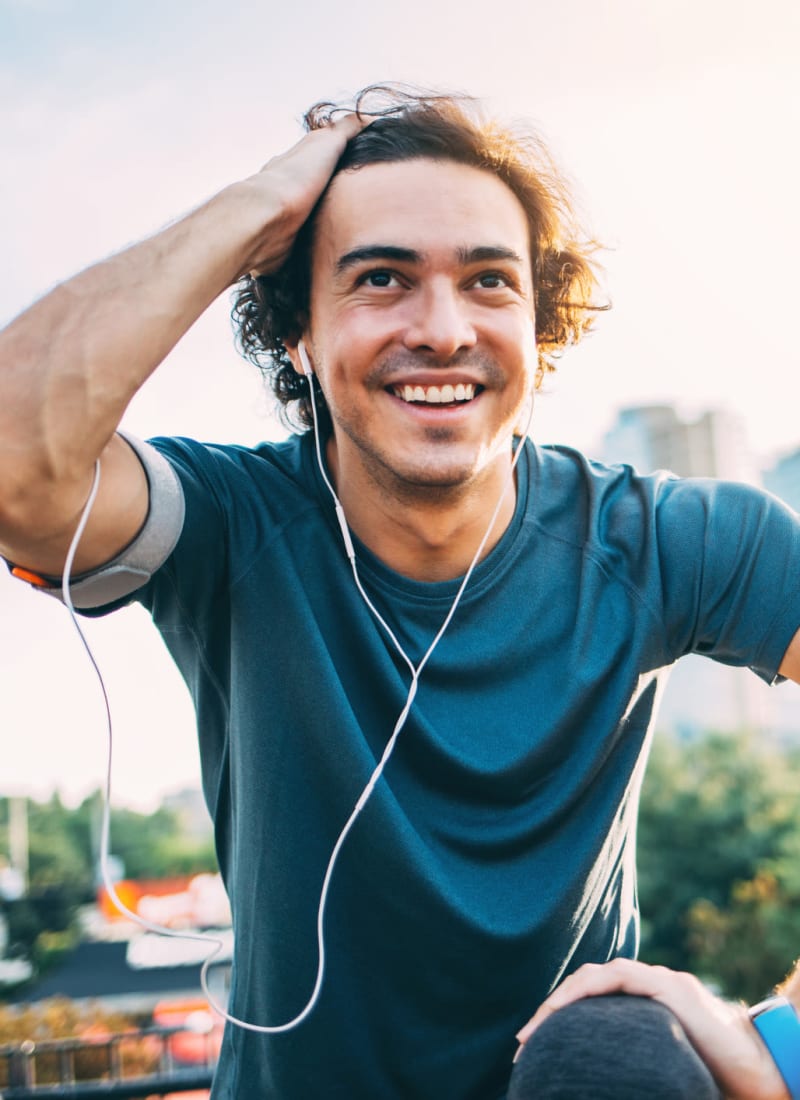 Resident exercising outside in Katy, Texas near Marquis at the Reserve