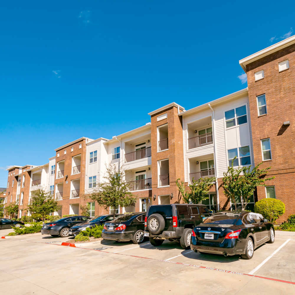 Apartments with cars at NOVU New Forest in Houston, Texas