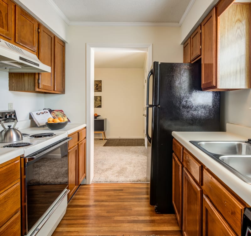 Spacious kitchen at Coach House Apartments in Kansas City, Missouri