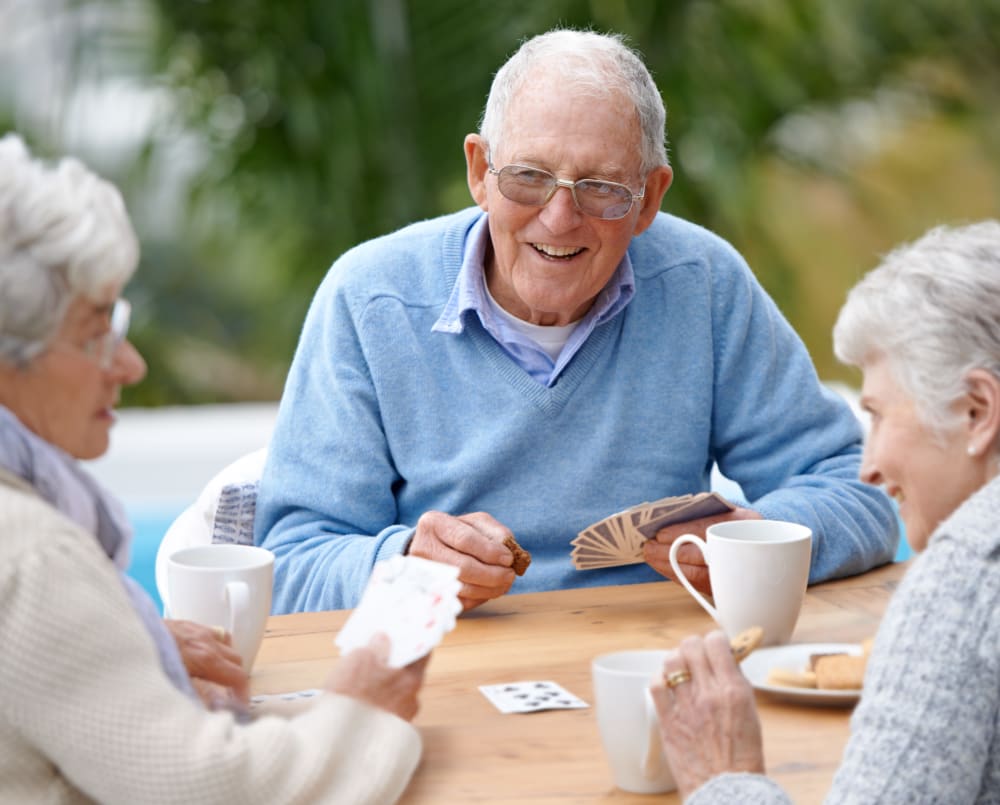 Resident playing card games together at WellQuest of Granite Bay in Granite Bay, California