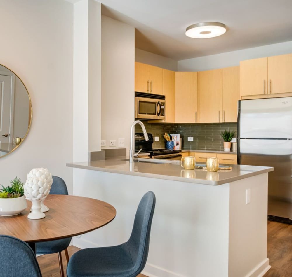 Comfortably decorated living space in a model home at Sofi at Morristown Station in Morristown, New Jersey