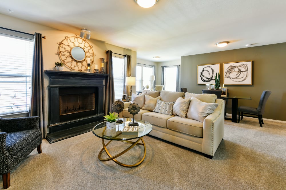 Bright living room at Cottages at Abbey Glen Apartments in Lubbock, Texas