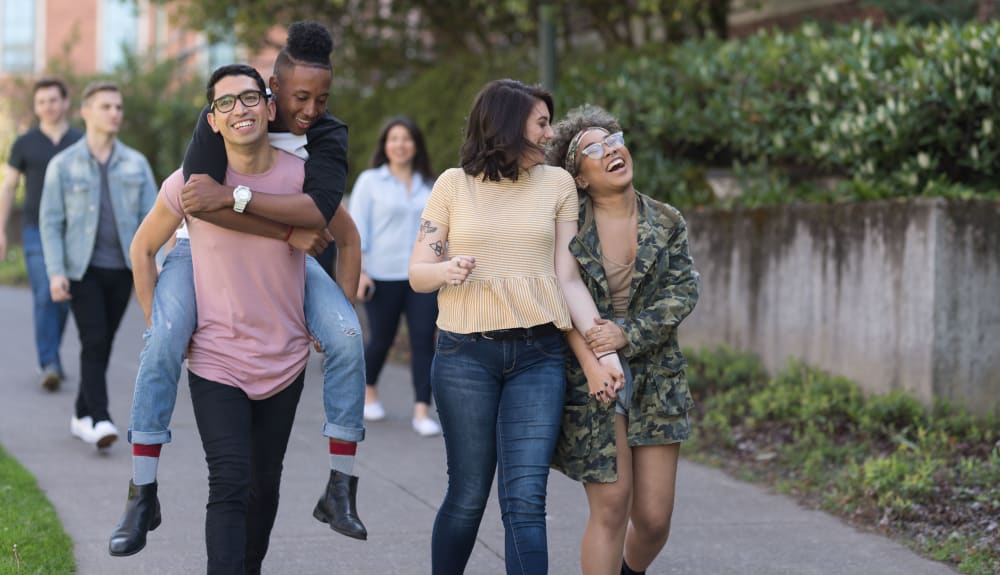 Students walking to University of Alabama near HERE Tuscaloosa in Tuscaloosa, Alabama