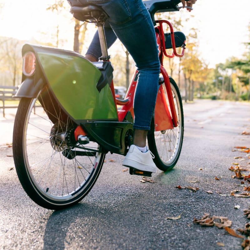 A resident rides a bike at Scott's Edge, Richmond, Virginia