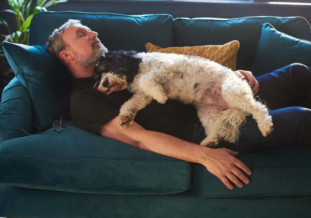 Resident with dog at Stoneridge in Kilgore, Texas