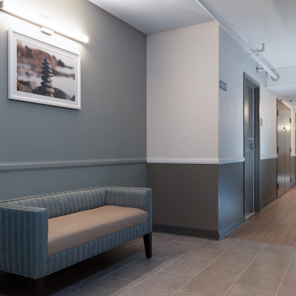 Bench and elevators at Golden West Tower Apts in Torrance, California