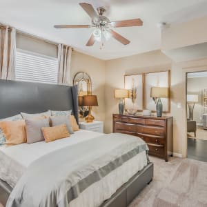 Spacious master bedroom of a senior apartment at The Spring at Silverton in Fort Worth, Texas.