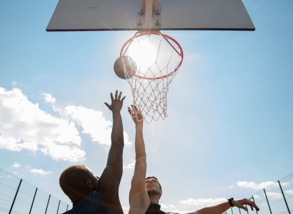 Residents playing basketball at McHugh Woods in Quantico, Virginia