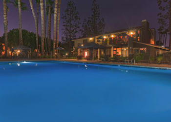 Swimming pool at night at Parcwood Apartments