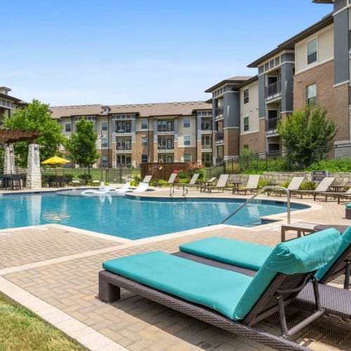 Longue chairs by the pool at 33Hundred in Austin, Texas