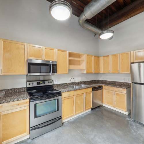 Kichen with enery-effecient appliances at Stadium Loft Apartments in Saint Louis, Missouri