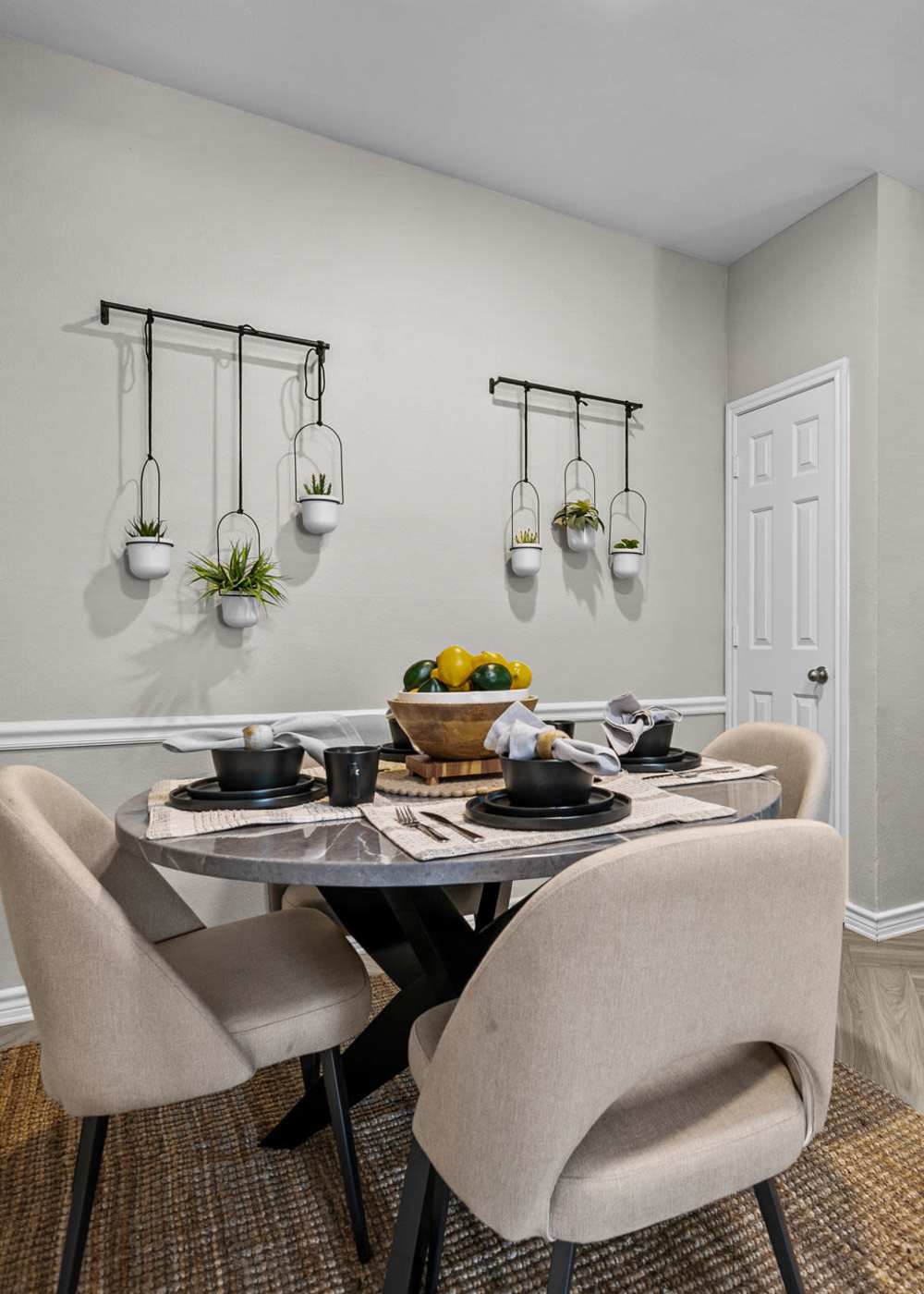 Dining area with a table and chairs at Station 3700 in Euless, Texas