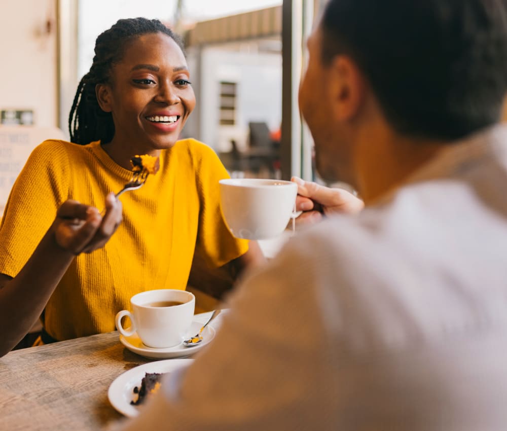 Residents at a coffee shop near The Columns at Westchase in Houston, Texas
