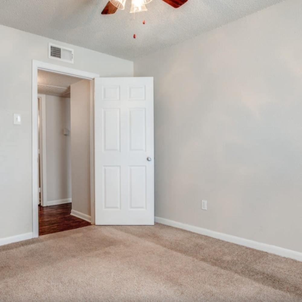 Bedroom of an apartment home at Creekstone in Dallas, Texas