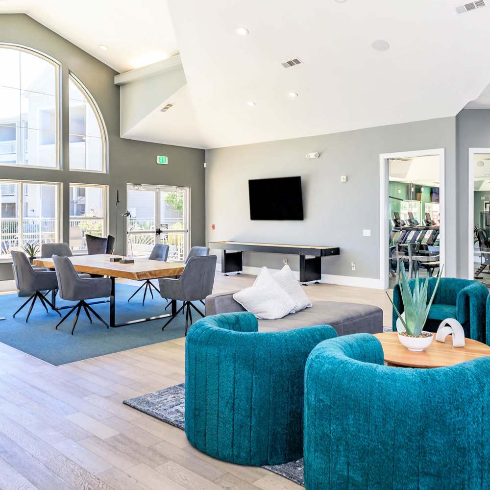 Clubhouse with television at One Belmar Place in Lakewood, Colorado