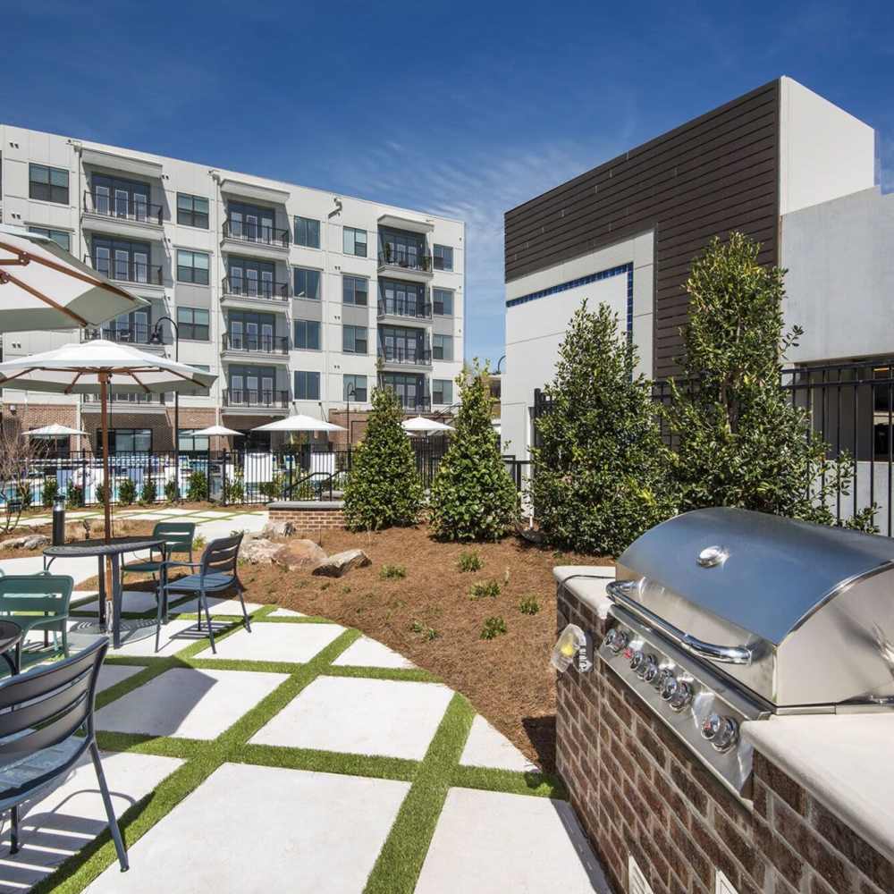 Outdoor patio area with grilling Stations at Siena Suwanee Town Center in Suwanee, Georgia