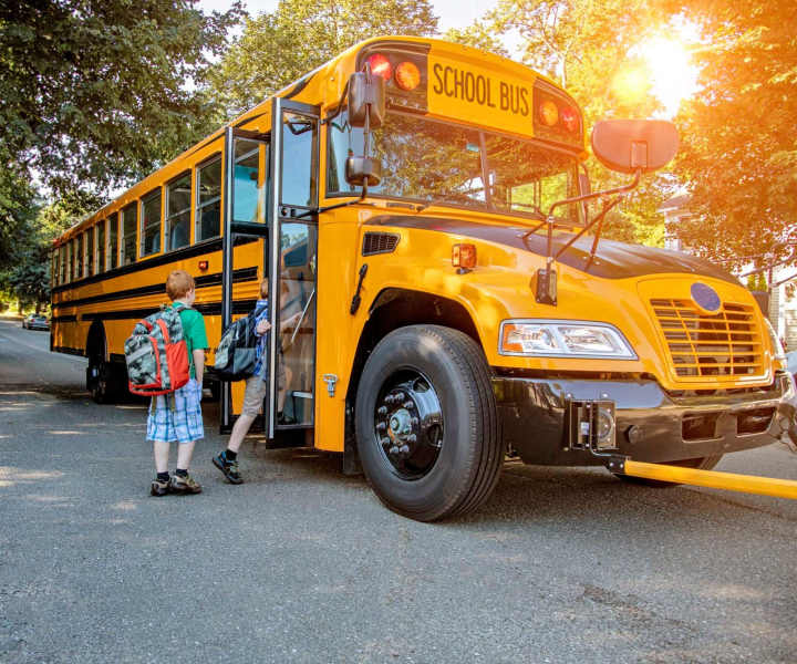 Resident children boarding their school bus near Kensington Square in Rock Hill, South Carolina