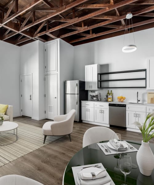 Round dining table with place settings at Brush Factory Lofts in Philadelphia, Pennsylvania