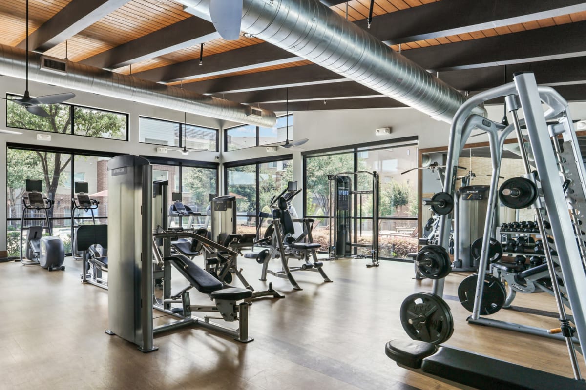 Fitness center with workout machines at Lantower Legacy Lakes in Lewisville, Texas
