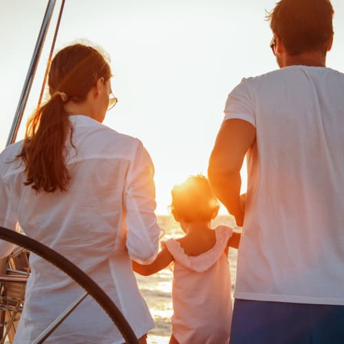 Family enjoying another beautiful day on their sailboat near Portside Ventura Harbor in Ventura, California