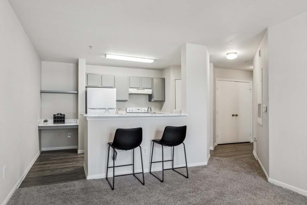 Kicthen with barstools area at Kimberly Pointe in Houston, Texas